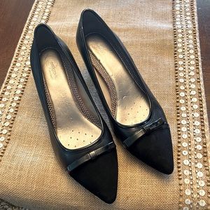 Black leather low heel pump